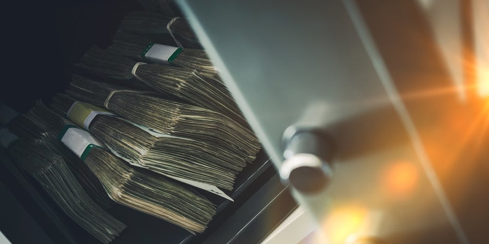 bigstock-Cash-Money-Safe-Deposit-121833653