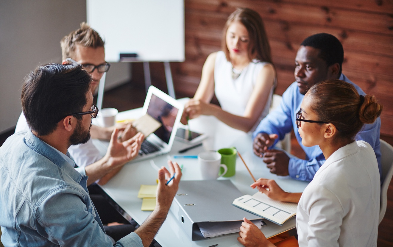 Group of multi-ethnic business partners discussing ideas